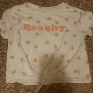 a peachy white crop top